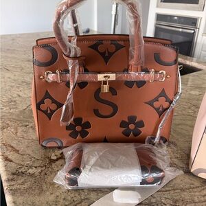 Brown or tan handbag with wallet